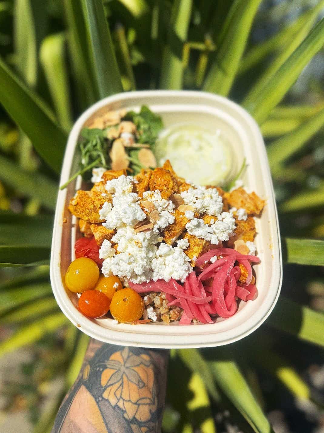 Wylde Provisions Farro Out Man bowl with chicken, feta, tomatoes and pickled onions